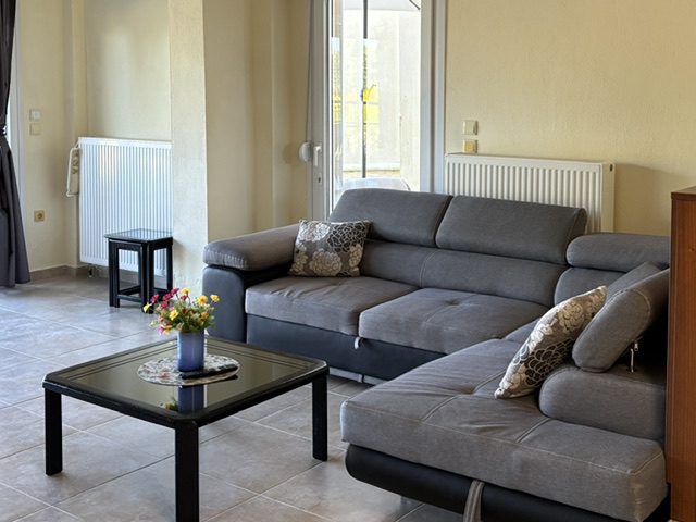 Living room seating area at Villa Beauty